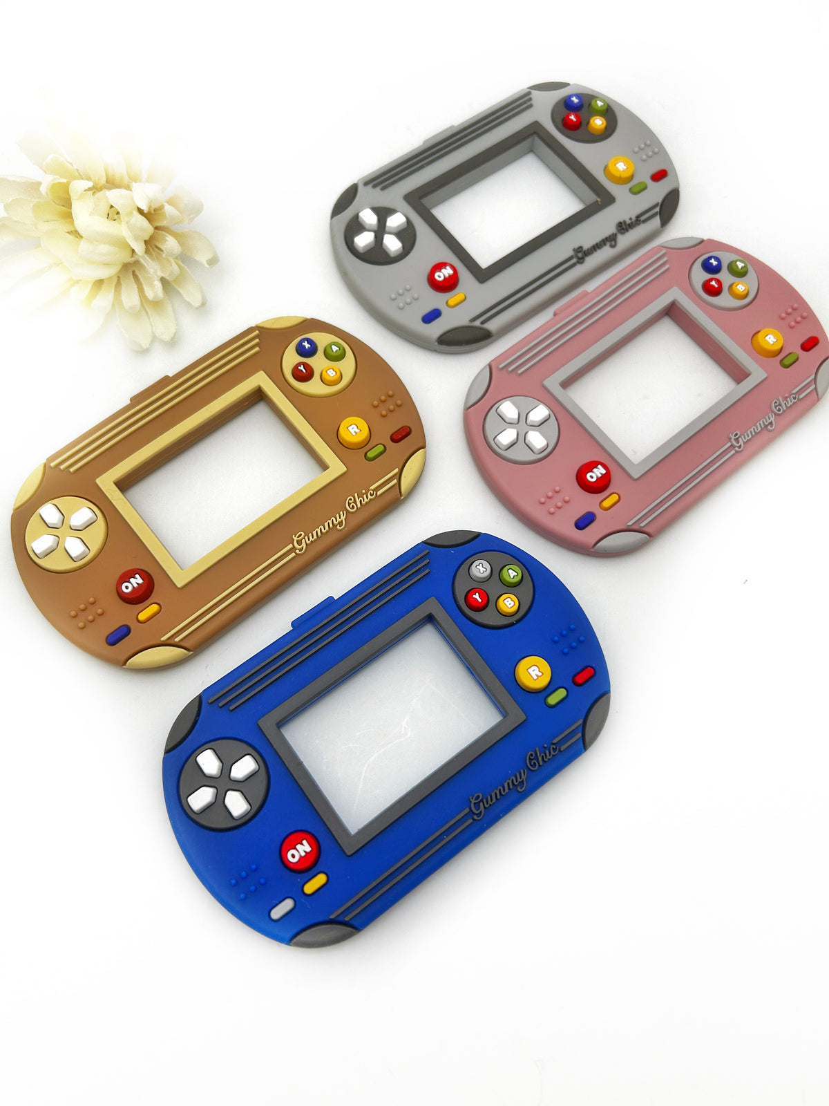 Gummy Chic Handheld Video Game Silicone Teether: Nostalgic & Safe Choice