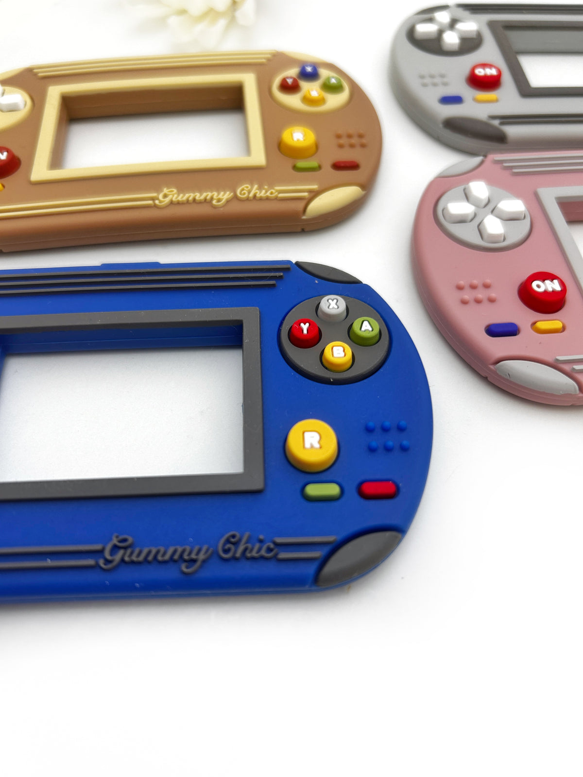 Gummy Chic Handheld Video Game Silicone Teether: Nostalgic & Safe Choice