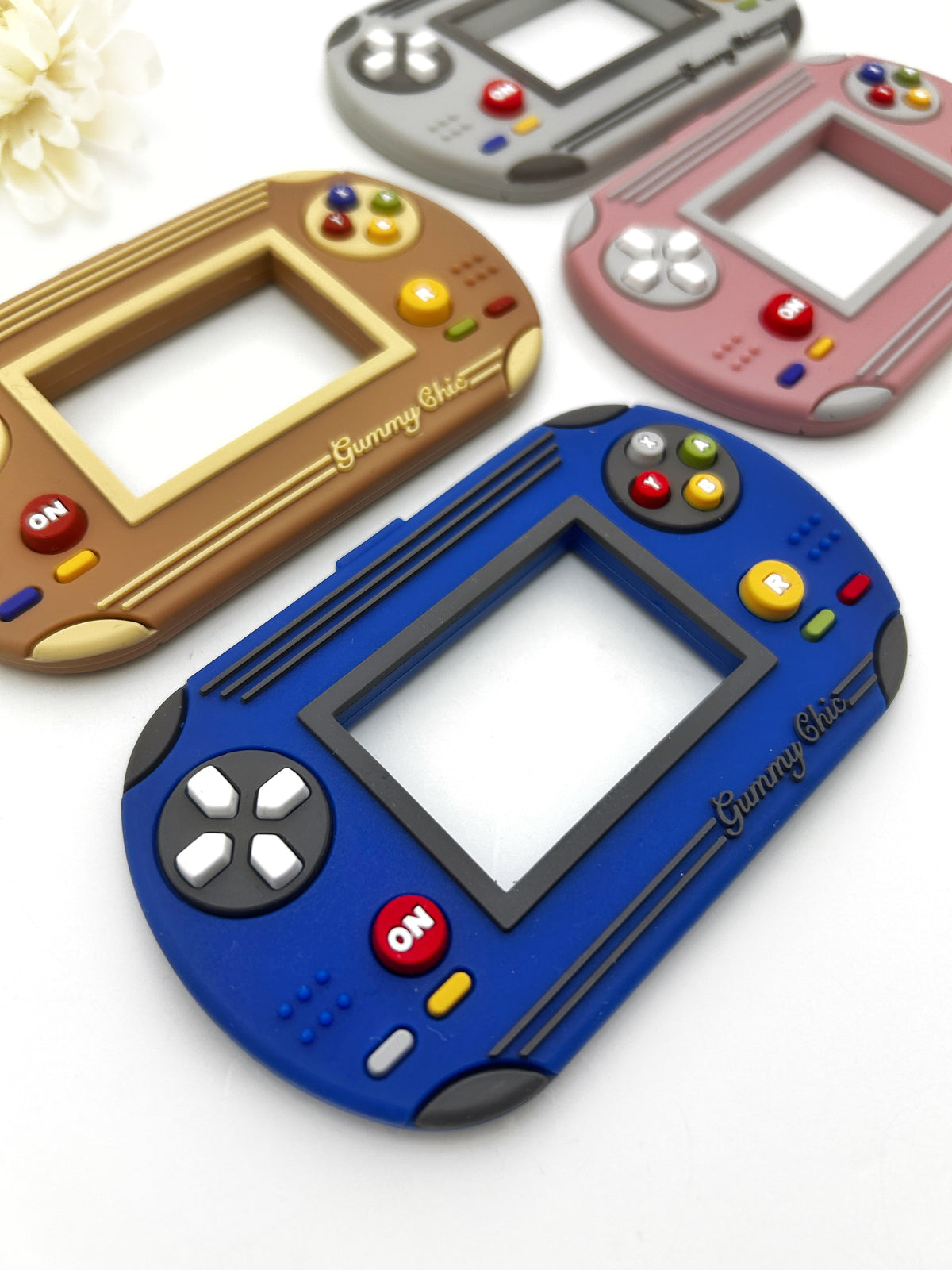 Gummy Chic Handheld Video Game Silicone Teether: Nostalgic & Safe Choice
