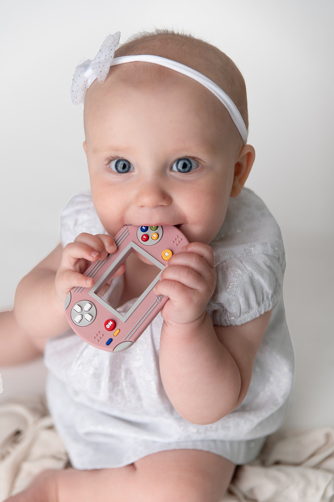 Gummy Chic Handheld Video Game Silicone Teether: Nostalgic & Safe Choice