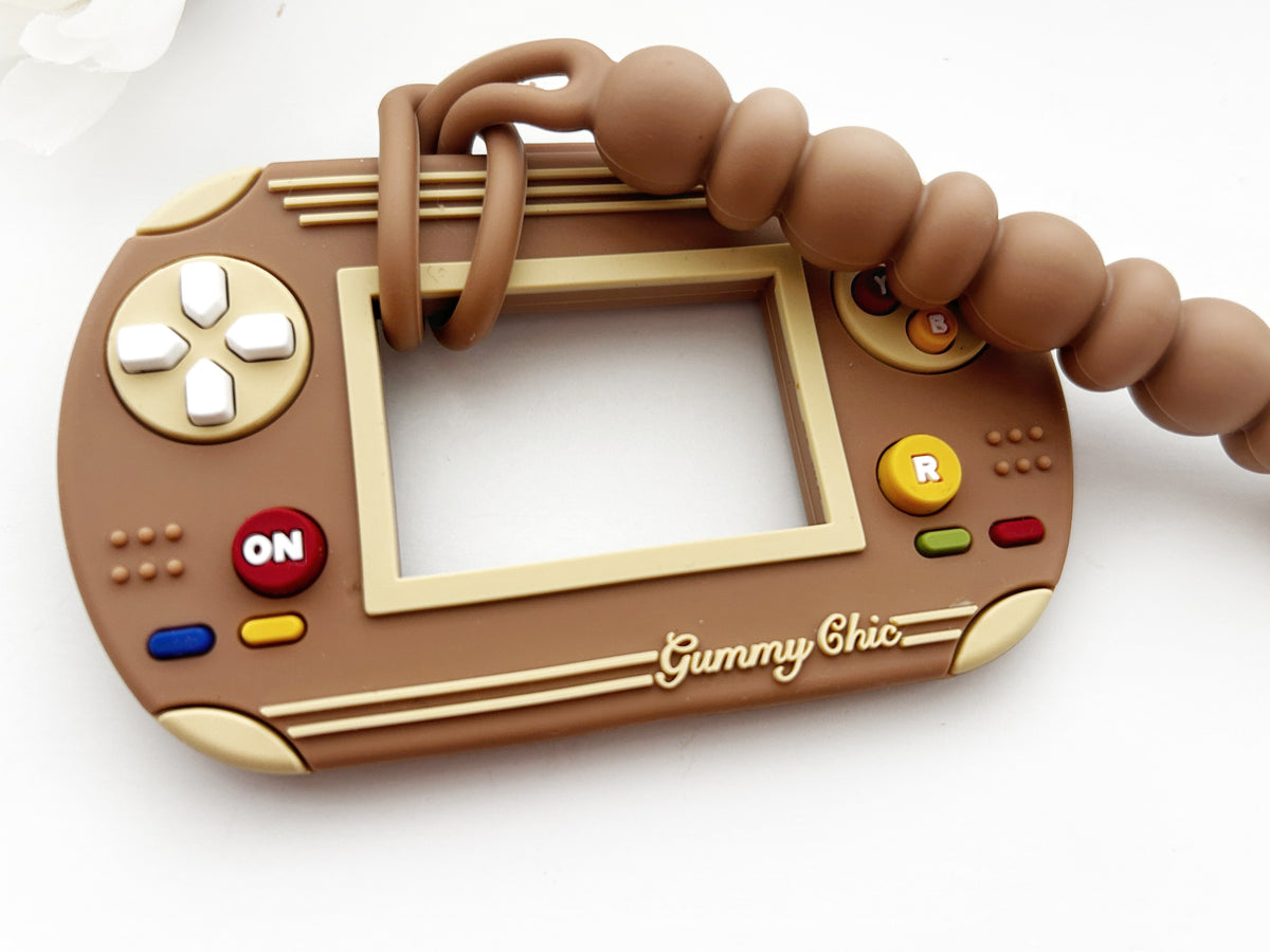 Gummy Chic Handheld Video Game Silicone Teether: Nostalgic & Safe Choice