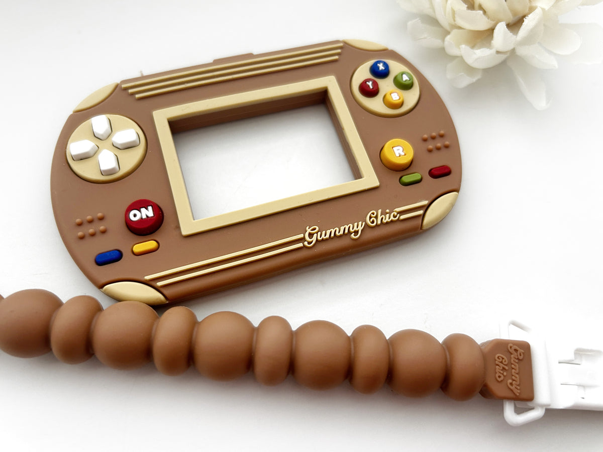 Gummy Chic Handheld Video Game Silicone Teether: Nostalgic & Safe Choice
