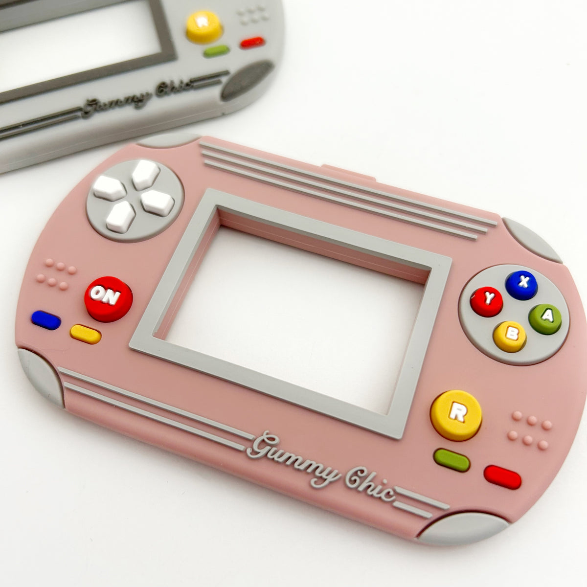 Gummy Chic Handheld Video Game Silicone Teether: Nostalgic & Safe Choice