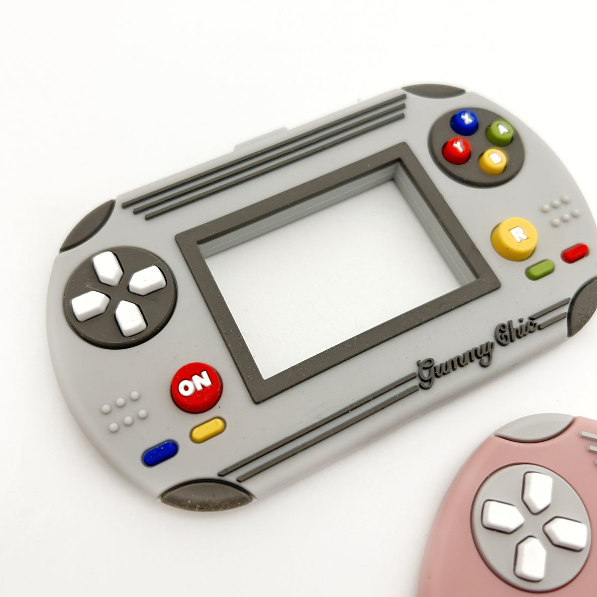 Gummy Chic Handheld Video Game Silicone Teether: Nostalgic & Safe Choice
