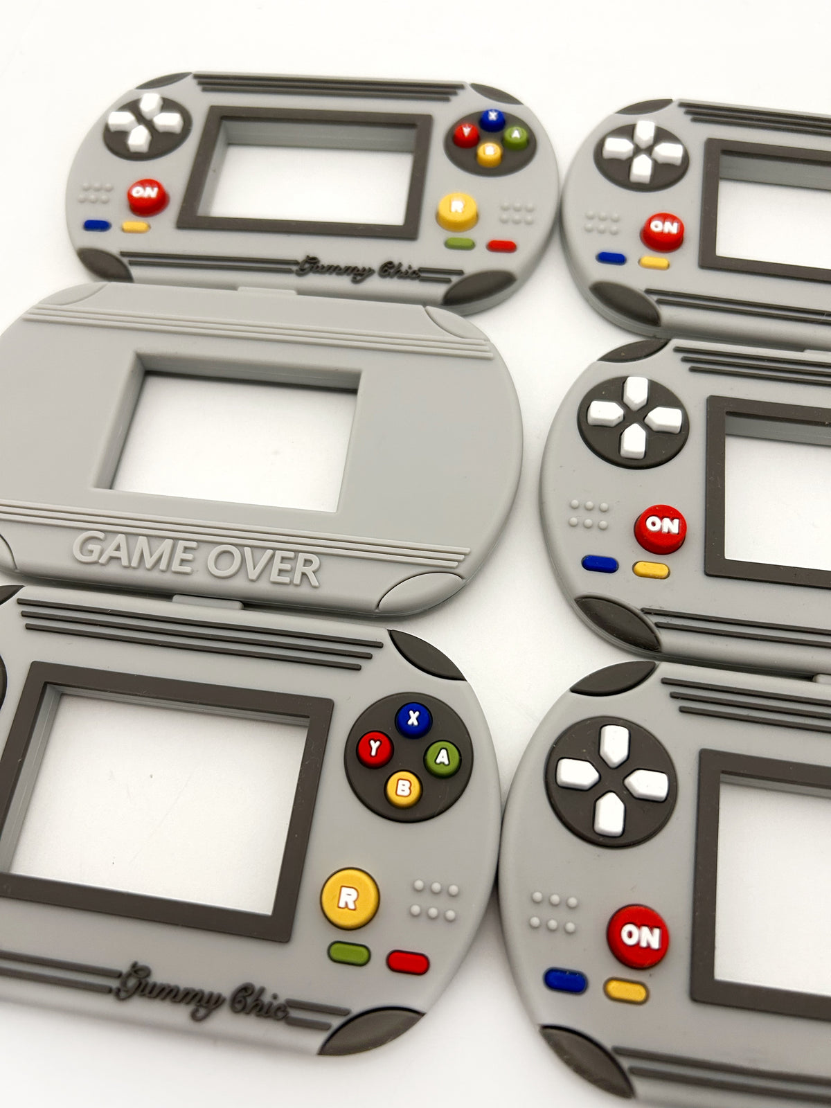 Gummy Chic Handheld Video Game Silicone Teether: Nostalgic & Safe Choice