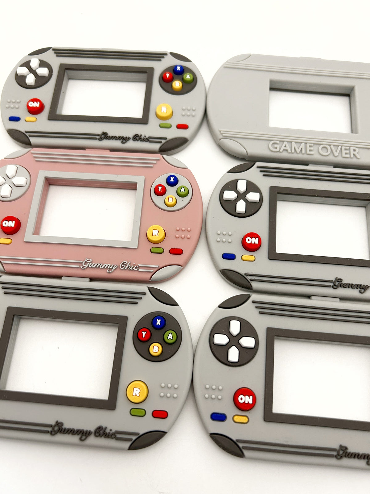 Gummy Chic Handheld Video Game Silicone Teether: Nostalgic & Safe Choice