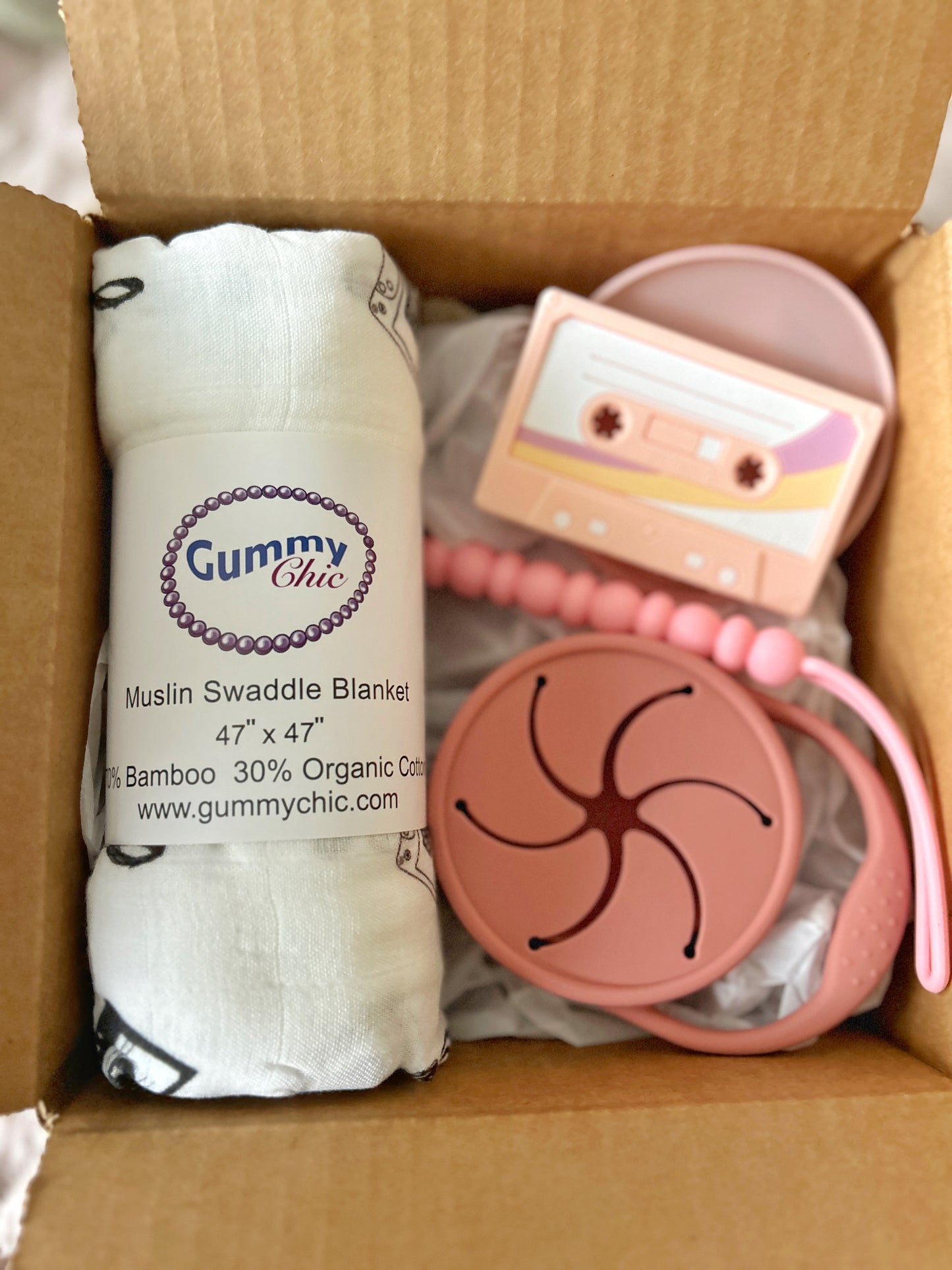 pink cassette tape teething toy, snack box pink, gender neutral blanket swaddle