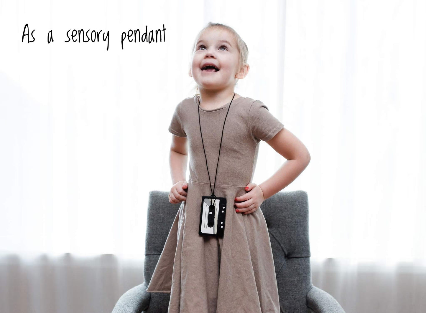 girl with cassette tape as pendant necklace