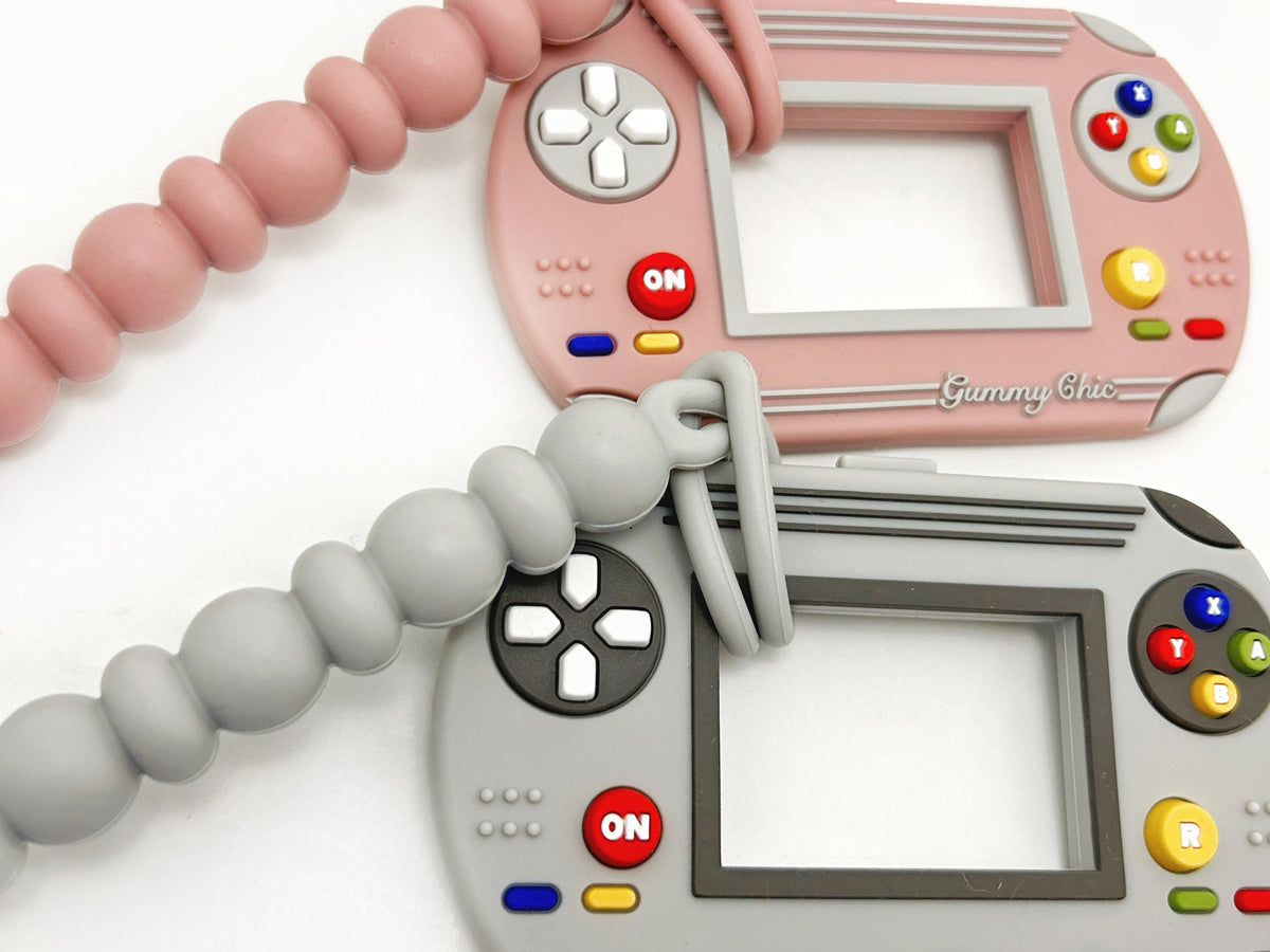 Gummy Chic Handheld Video Game Silicone Teether: Nostalgic & Safe Choice