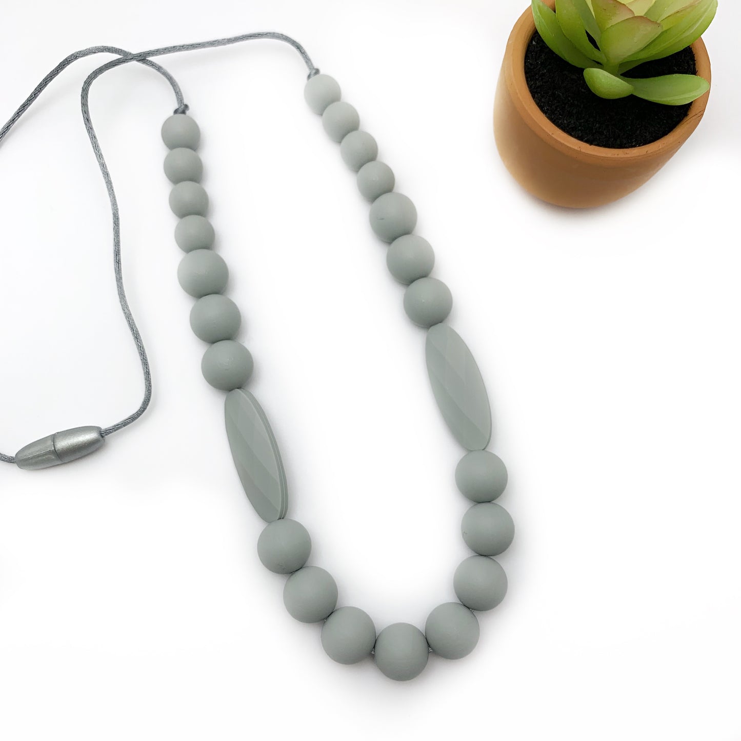 The Jade Nursing and Babywearing Silicone Necklace: Safe, Stylish, and Sensory