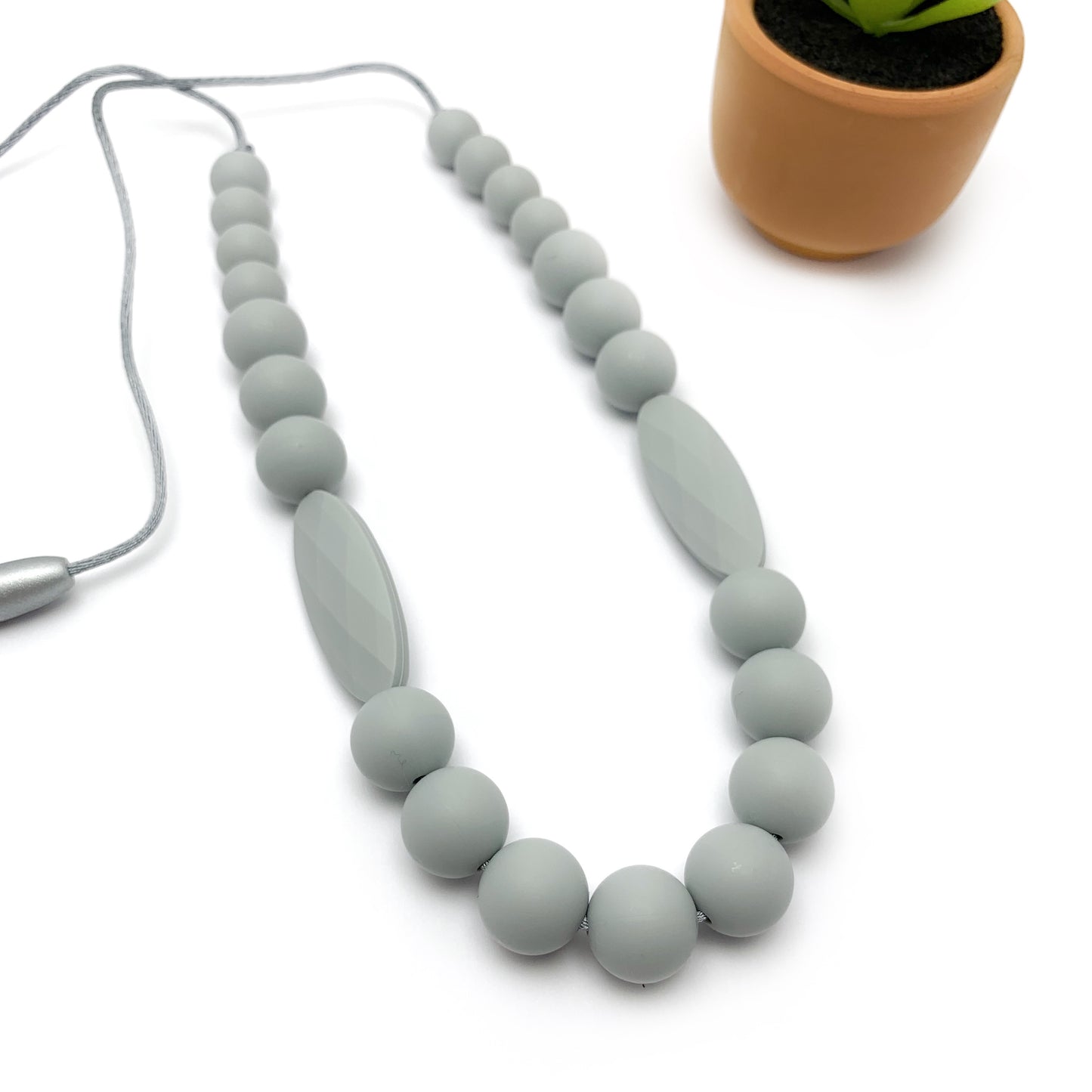 The Jade Nursing and Babywearing Silicone Necklace: Safe, Stylish, and Sensory