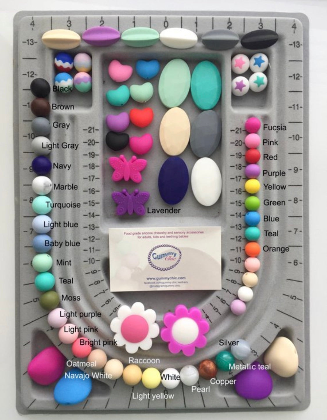 Colorful silicone beads in various shapes and colors for personalized fidget chew necklace for kids.