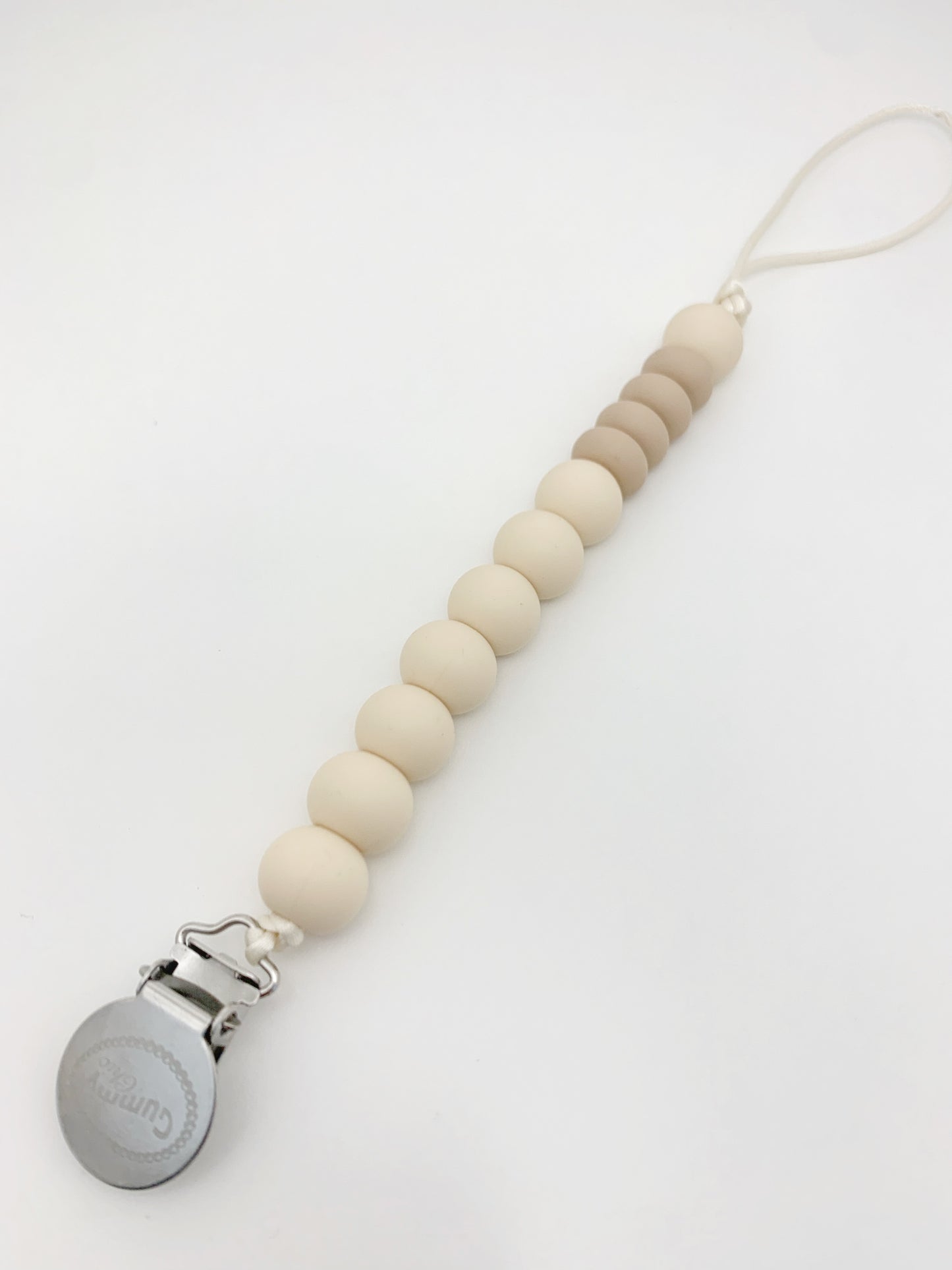 beige pacifier clip for baby