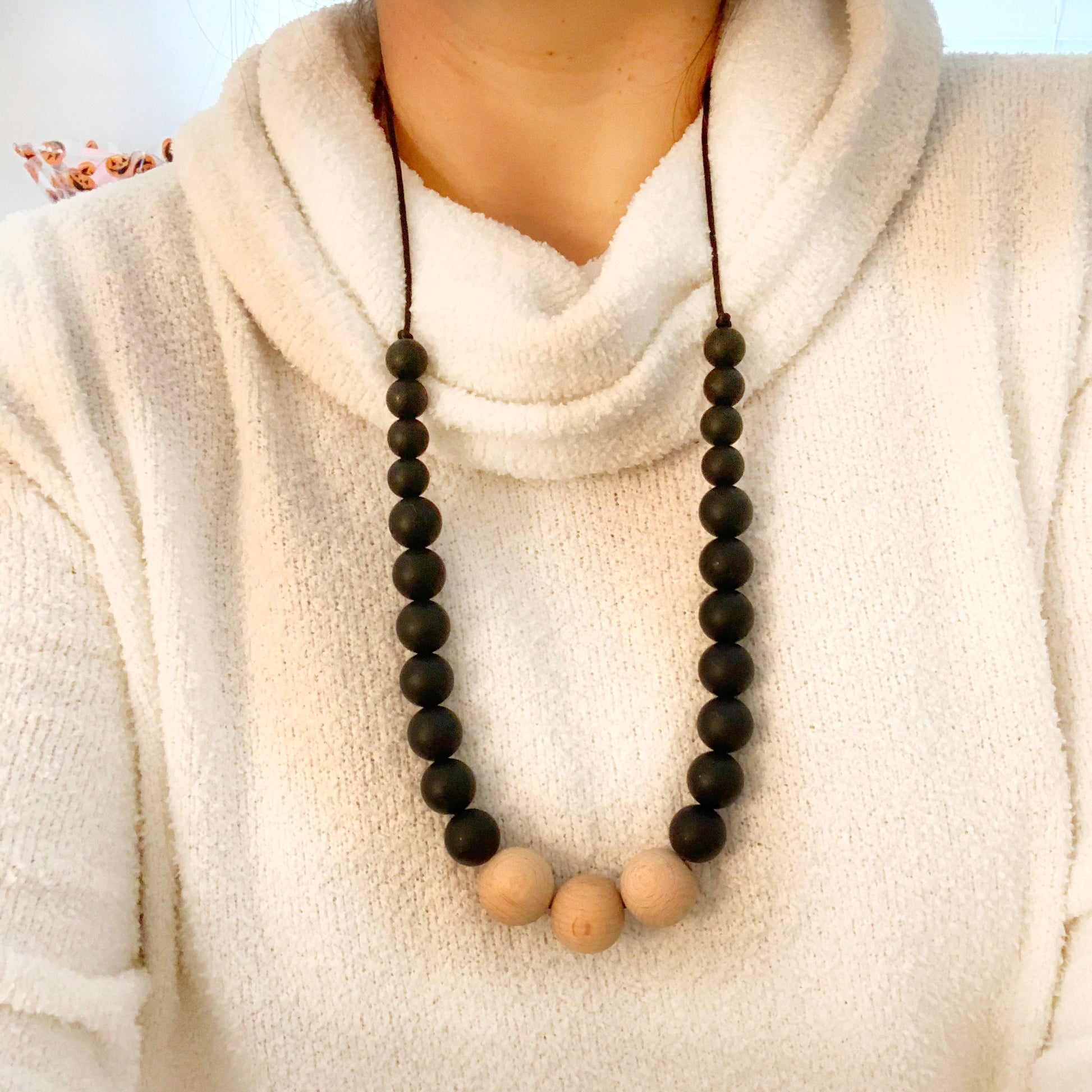 black silicone beaded necklace on mom wearing it.