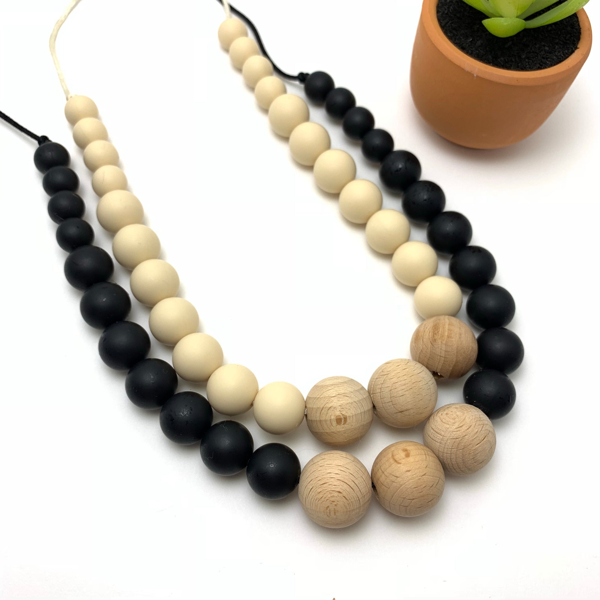 black and beige beaded in silicone and wood