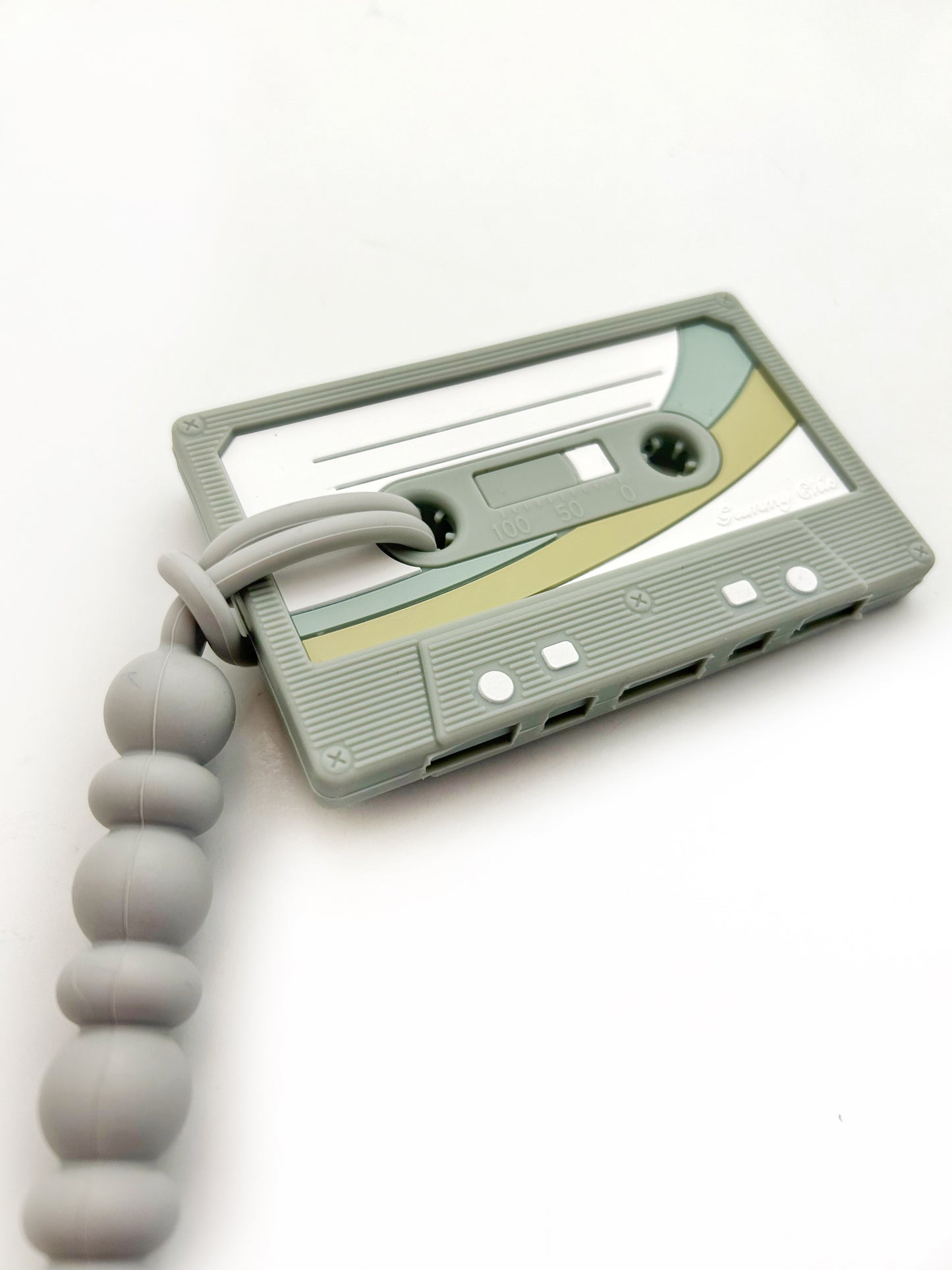grey grey cassette teether for chewing with a silicone clip