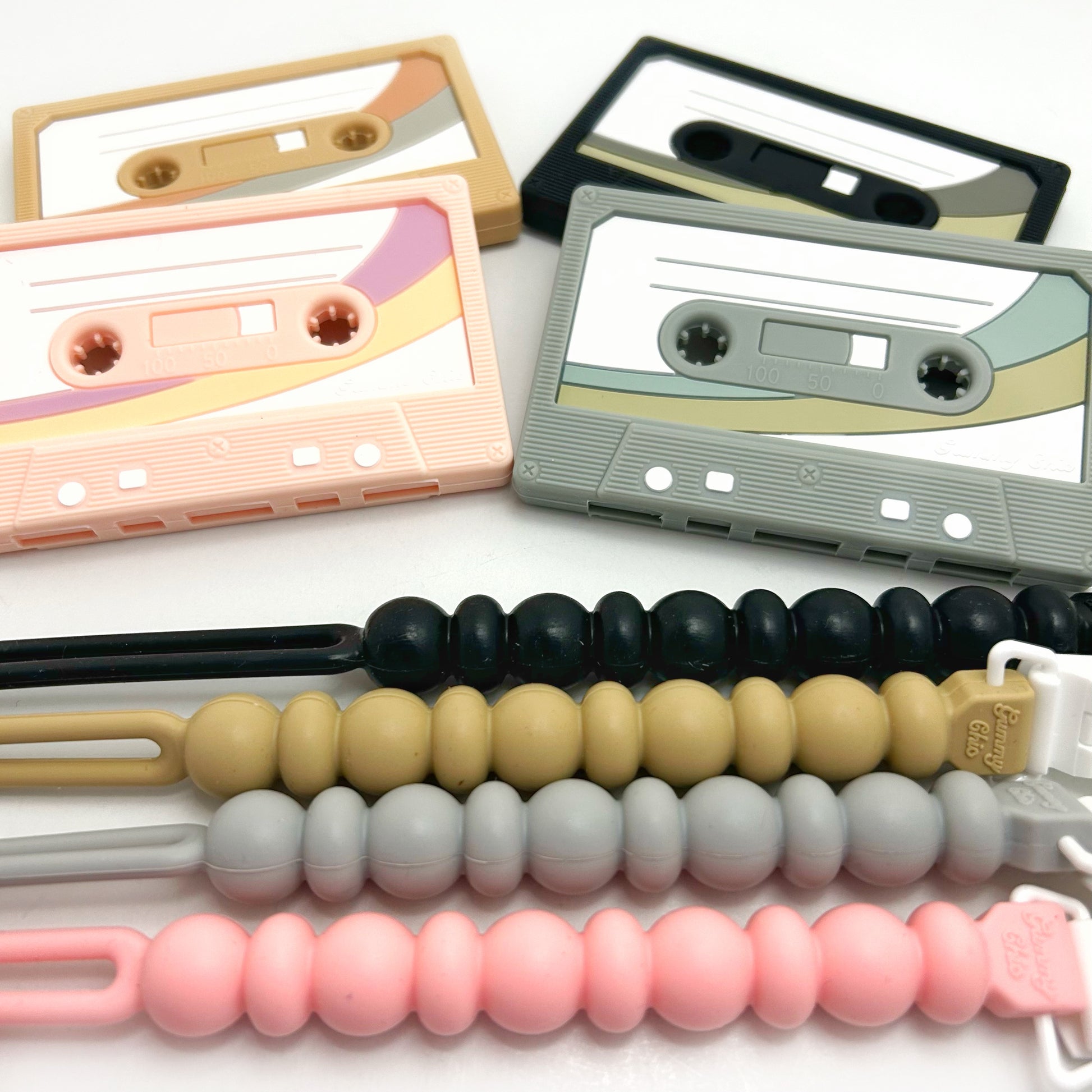 cassette teether with several pacifier clips 