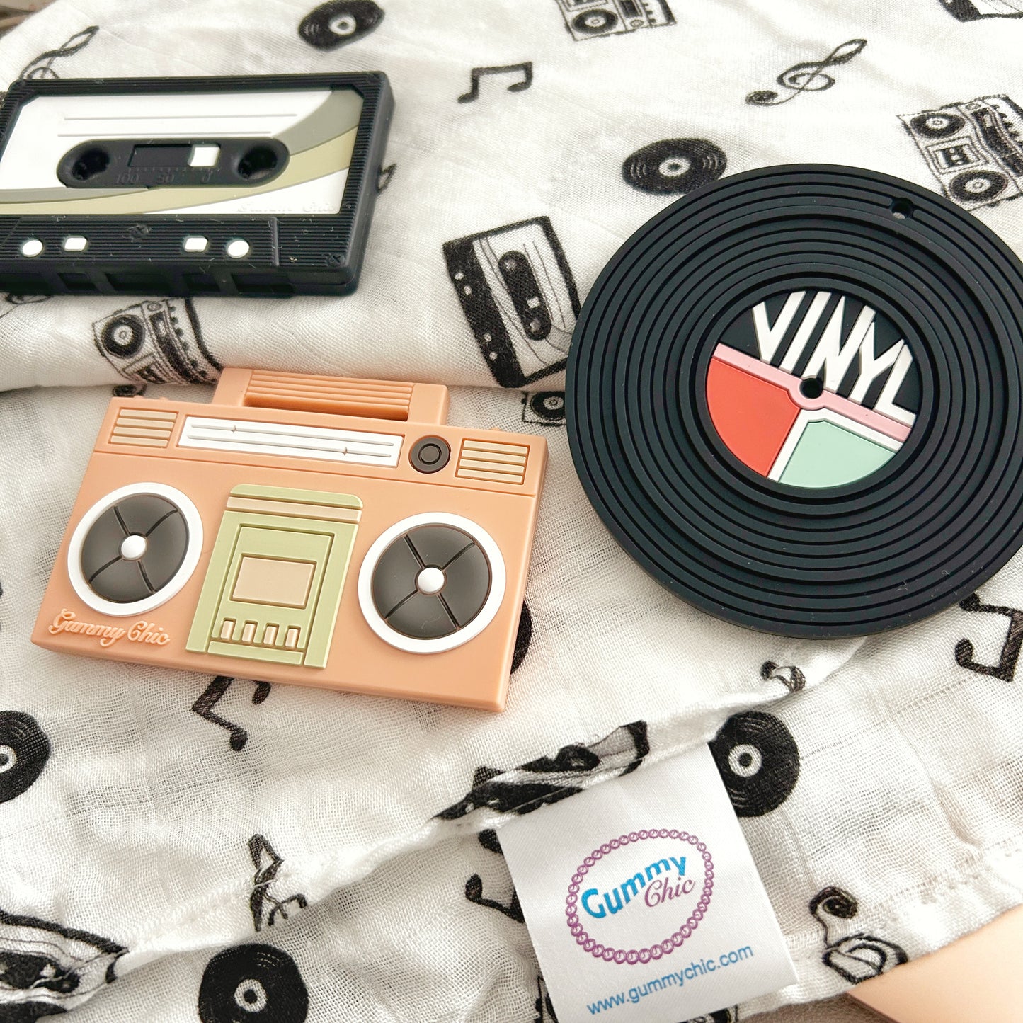 black and white receiving blanket with music theme items