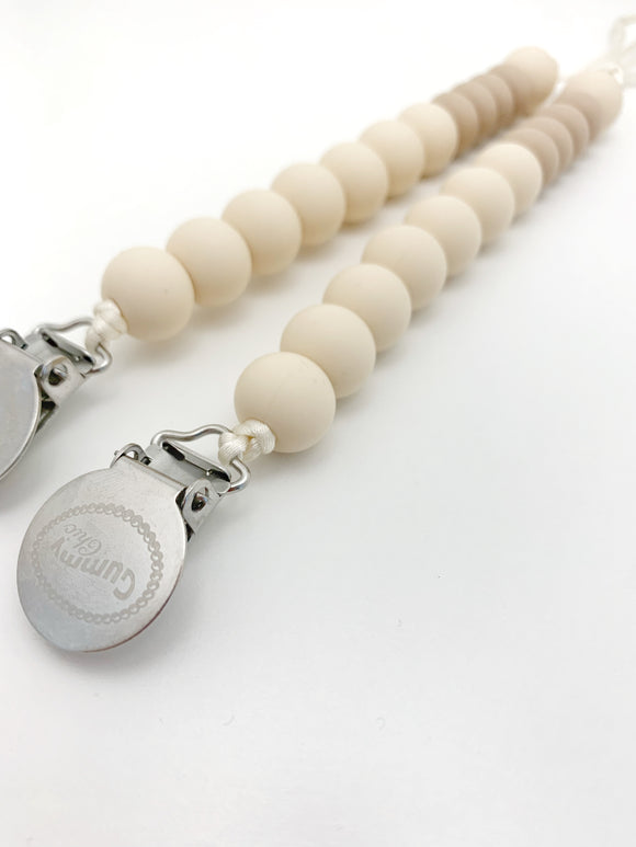 beige pacifier clip with metal clip 