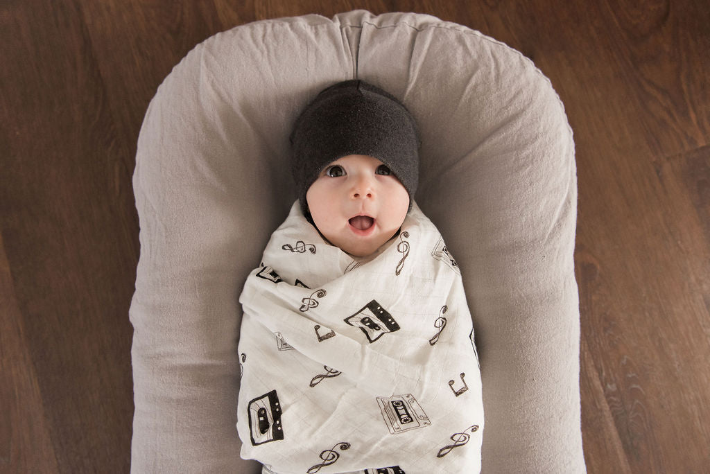 black and white baby blanket with music notes