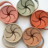 different colors of collapsible snack cups